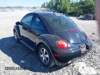 2005 Volkswagen New Beetle Coupe GL with VIN 3VWBK31C25M413925, listed as a IAAI auction lot 39823280 with 72,382 mi miles. Bid and sale history available at carsss.com. Image 3.