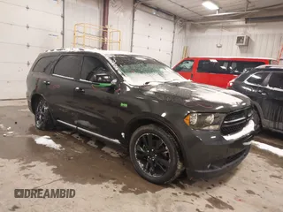 2011 Dodge Durango Crew with VIN 1D4SE4GT9BC638964, listed as a IAAI auction lot 41546778 with 90,959 mi miles and . Bid and sale history available at carsss.com. Image 1.