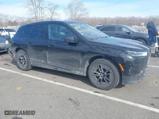 2023 BMW iX xDrive50 with VIN WB523CF02PCM45529, listed as a IAAI auction lot 41527811 with 33,429 mi miles. Bid and sale history available at carsss.com. Image 1.