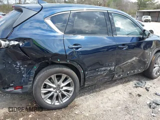 2021 Mazda CX-5 Grand Touring with VIN JM3KFBDM8M0484383, listed as a IAAI auction lot 41800786 with 58,617 mi miles. Bid and sale history available at carsss.com. Image 6.