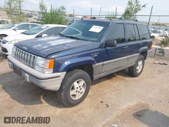 1994 Jeep Grand Cherokee Laredo z VIN 1J4GZ58Y7RC233746, wystawiony jako IAAI lot #42722206 z przebiegiem 196 875 mil mil oraz . Historia ofert i sprzedaży dostępna na DreamBid. Obrazek 2.