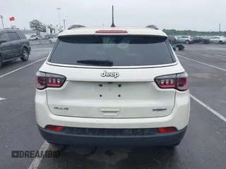 2021 Jeep Compass Latitude with VIN 3C4NJDBB6MT537568, listed as a IAAI auction lot 42528180 with 74,003 mi miles and . Bid and sale history available at DreamBid. Image 16.