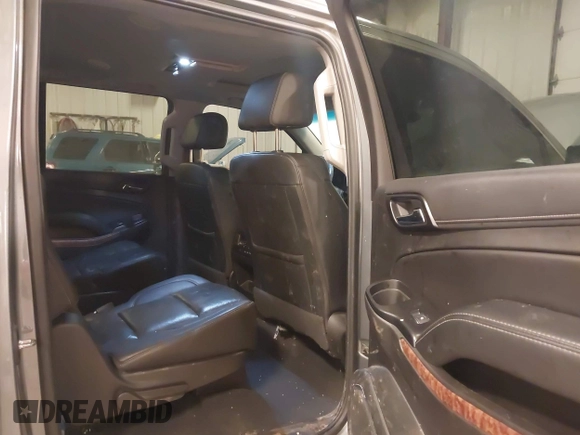 2019 Chevrolet Suburban Premier with VIN 1GNSKJKC1KR291629, listed as a IAAI auction lot 41565675 with 129,672 mi miles and . Bid and sale history available at DreamBid. Image 8.