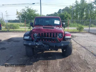 2021 Jeep Gladiator Mojave with VIN 1C6JJTEG8ML592381, listed as a IAAI auction lot 42369581 with 75,295 mi miles and . Bid and sale history available at DreamBid. Image 13.