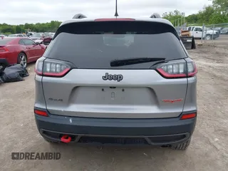 2020 Jeep Cherokee Trailhawk z VIN 1C4PJMBX0LD588251, wystawiony jako IAAI lot #42310054 z przebiegiem 47 780 mil mil oraz . Historia ofert i sprzedaży dostępna na DreamBid. Obrazek 17.