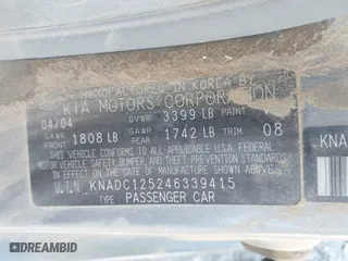 2004 Kia Rio with VIN KNADC125246339415, listed as a IAAI auction lot 41978078 with 127,727 mi miles. Bid and sale history available at carsss.com. Image 9.