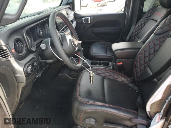 2024 Jeep Wrangler Rubicon X with VIN 1C4RJXFG2RW153197, listed as a Copart auction lot 76521384 with 3,897 mi miles and Salvage title. Bid and sale history available at DreamBid. Image 7.