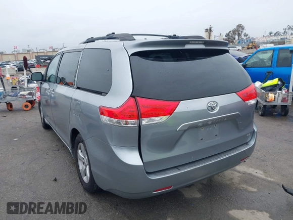 2011 Toyota Sienna LE AAS with VIN 5TDKK3DC0BS119675, listed as a IAAI auction lot 41809573 with 289,496 mi miles. Bid and sale history available at carsss.com. Image 3.