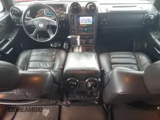 2005 Hummer H2 SUV with VIN 5GRGN23U35H128685, listed as a Copart auction lot 43031545 with 132,053 mi miles and Salvage Title. Bid and sale history available at carsss.com. Image 8.