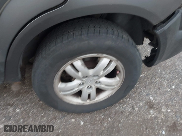 2007 Hyundai Tucson SE with VIN KM8JN12D57U522679, listed as a IAAI auction lot 41891506 with 223,190 mi miles. Bid and sale history available at carsss.com. Image 12.