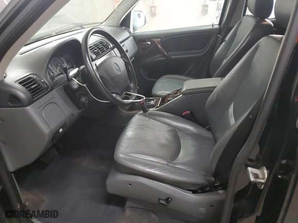 1999 Mercedes-Benz M-Class with VIN 4JGAB54E7XA136885, listed as a Copart auction lot 42031775 with 173,079 mi miles and Salvage Title. Bid and sale history available at carsss.com. Image 7.