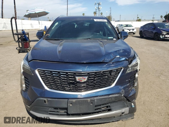 2019 Cadillac XT4 FWD Premium Luxury with VIN 1GYFZCR42KF104457, listed as a Copart auction lot 52783485 with 57,572 mi miles and Salvage title. Bid and sale history available at DreamBid. Image 5.