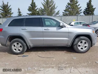 2014 Jeep Grand Cherokee Laredo with VIN 1C4RJFAG7EC243121, listed as a IAAI auction lot 41925695 with 147,999 mi miles. Bid and sale history available at carsss.com. Image 13.