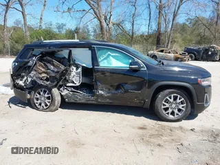 2020 GMC Acadia SLT with VIN 1GKKNMLS4LZ227985, listed as a IAAI auction lot 41864090 with 39,295 mi miles and . Bid and sale history available at DreamBid. Image 14.