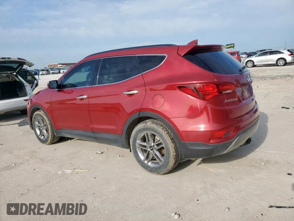 2017 Hyundai Santa Fe 2.4L z VIN 5XYZU3LB5HG473456, wystawiony jako Copart lot #55631615 z przebiegiem 92 374 mil mil oraz Szkoda całkowita • Salvage title. Historia ofert i sprzedaży dostępna na DreamBid. Obrazek 2.