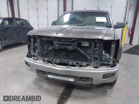 2014 Chevrolet Silverado 1500 LT with VIN 1GCVKREC9EZ240612, listed as a IAAI auction lot 41108566 with 200,625 mi miles and . Bid and sale history available at DreamBid. Image 13.