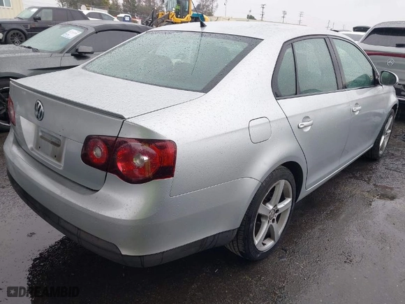 2009 Volkswagen Jetta Sedan S with VIN 3VWJZ71K29M148712, listed as a IAAI auction lot 41724523 with 112,043 mi miles. Bid and sale history available at carsss.com. Image 4.