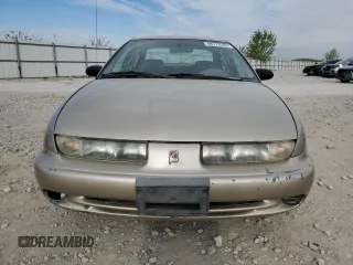 1999 Saturn SL с VIN 1G8ZK5278XZ269792, выставлен на аукционе Copart как лот 48773395 с пробегом 159 506 миль миль и Списание • Salvage title. История ставок и продаж доступна на DreamBid. Изображение 5.