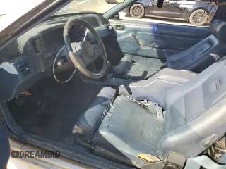 1987 Ford Mustang with VIN 1FABP40E6HF228235, listed as a Copart auction lot 76833284 with 95,222 mi miles and Salvage title. Bid and sale history available at DreamBid. Image 7.