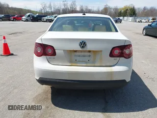 2009 Volkswagen Jetta SE z VIN 3VWRM71K99M057390, wystawiony jako IAAI lot #42094648 z przebiegiem 168 533 mil mil oraz . Historia ofert i sprzedaży dostępna na DreamBid. Obrazek 17.