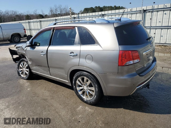 2012 Kia Sorento SX with VIN 5XYKW4A25CG212101, listed as a Copart auction lot 47440555 with 149,970 mi miles and Salvage Title. Bid and sale history available at carsss.com. Image 2.