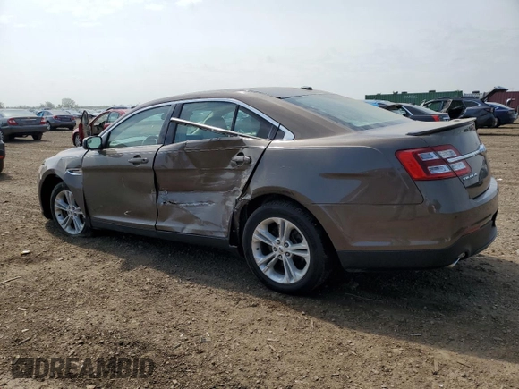 2015 Ford Taurus SEL with VIN 1FAHP2E82FG158662, listed as a Copart auction lot 58233875 with 159,174 mi miles and Salvage title. Bid and sale history available at DreamBid. Image 2.
