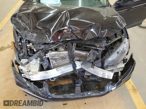 2020 Honda Civic LX z VIN 2HGFC2F64LH551171, wystawiony jako Copart lot #48491715 z przebiegiem 56 715 mil mil oraz Szkoda całkowita • Salvage title. Historia ofert i sprzedaży dostępna na DreamBid. Obrazek 13.