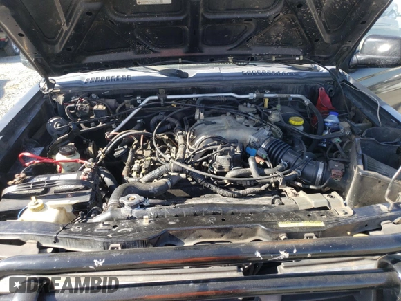 2000 Nissan Frontier XE z VIN 1N6ED27Y3YC324102, wystawiony jako Copart lot #56922155 z przebiegiem 202 233 mil mil oraz Szkoda całkowita • Salvage title. Historia ofert i sprzedaży dostępna na DreamBid. Obrazek 11.