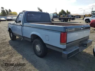1988 Ford F-150 with VIN 1FTDF15Y3JPB49810, listed as a Copart auction lot 68766294 with 67,315 mi miles and Salvage Title. Bid and sale history available at carsss.com. Image 2.