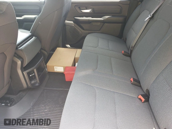 2023 Ram 1500 Tradesman with VIN 1C6RRFGG7PN620433, listed as a IAAI auction lot 42796101 with 48 mi miles and . Bid and sale history available at DreamBid. Image 6.