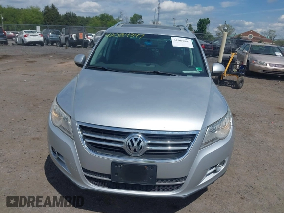 2011 Volkswagen Tiguan SE with VIN WVGBV7AX4BW532488, listed as a IAAI auction lot 42084347 with 107,529 mi miles and . Bid and sale history available at DreamBid. Image 6.