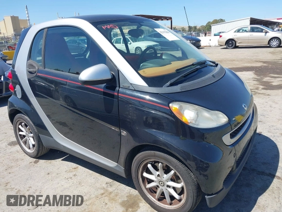 2008 Smart fortwo Pure with VIN WMEEJ31X78K180398, listed as a IAAI auction lot 42193886 with 98,136 mi miles and . Bid and sale history available at DreamBid. Image 1.