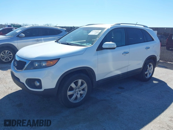 2013 Kia Sorento LX with VIN 5XYKT4A2XDG337427, listed as a IAAI auction lot 41730880 with 219,984 mi miles. Bid and sale history available at carsss.com. Image 2.