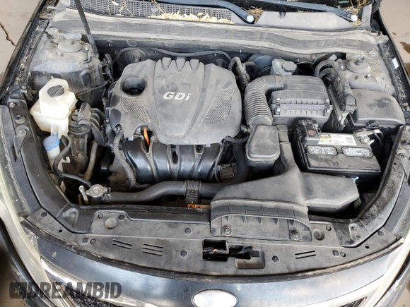 2013 Kia Optima EX z VIN 5XXGN4A75DG253693, wystawiony jako Copart lot #59227785 z przebiegiem 191 062 mil mil oraz Szkoda całkowita • Salvage title. Historia ofert i sprzedaży dostępna na DreamBid. Obrazek 11.