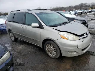 2009 Toyota Sienna XLE with VIN 5TDBK22C59S024455, listed as a Copart auction lot 44495215 with 215,282 mi miles and Salvage Title. Bid and sale history available at DreamBid. Image 4.