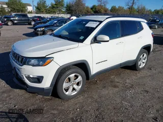 2020 Jeep Compass Latitude with VIN 3C4NJDBB2LT115599, listed as a IAAI auction lot 40970548 with 63,349 mi miles. Bid and sale history available at carsss.com. Image 2.