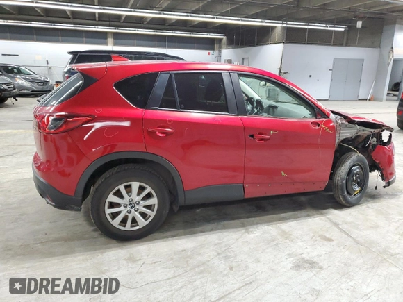 2016 Mazda CX-5 Touring z VIN JM3KE4CY6G0647362, wystawiony jako Copart lot #58081855 z przebiegiem 86 372 mil mil oraz Szkoda całkowita • Salvage title. Historia ofert i sprzedaży dostępna na DreamBid. Obrazek 3.