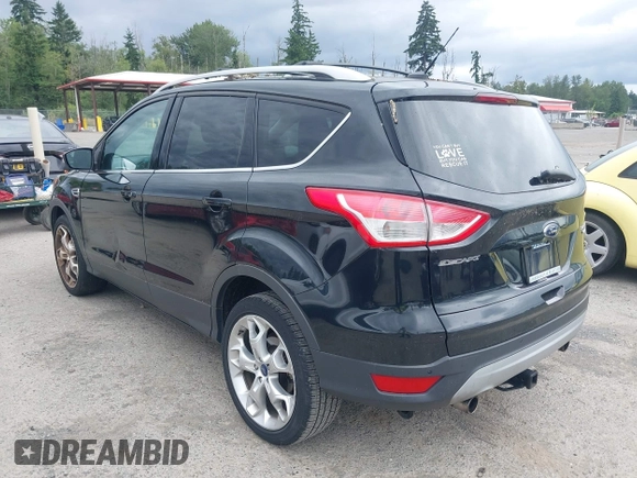 2013 Ford Escape Titanium with VIN 1FMCU9J98DUB02238, listed as a IAAI auction lot 42609782 with 168,574 mi miles and . Bid and sale history available at DreamBid. Image 3.