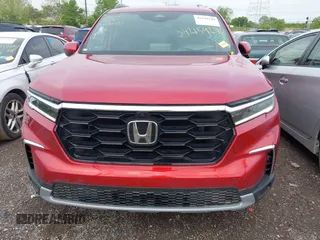 2025 Honda Pilot Elite z VIN 5FNYG1H82SB053897, wystawiony jako IAAI lot #42159290 z przebiegiem 6 168 mil mil oraz . Historia ofert i sprzedaży dostępna na DreamBid. Obrazek 13.
