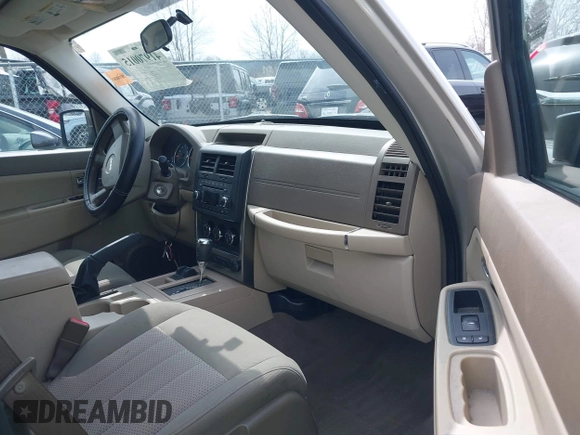2009 Jeep Liberty Sport with VIN 1J8GN28K69W512320, listed as a IAAI auction lot 41970015 with 115,443 mi miles. Bid and sale history available at carsss.com. Image 5.