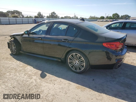 2019 BMW 5 Series M550i xDrive with VIN WBAJB9C50KB464503, listed as a Copart auction lot 56995825 with 67,324 mi miles and Salvage title. Bid and sale history available at DreamBid. Image 2.
