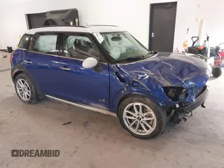 2015 MINI Cooper Countryman S with VIN WMWZC5C58FWP45505, listed as a IAAI auction lot 41012241 with 108,986 mi miles. Bid and sale history available at carsss.com. Image 1.