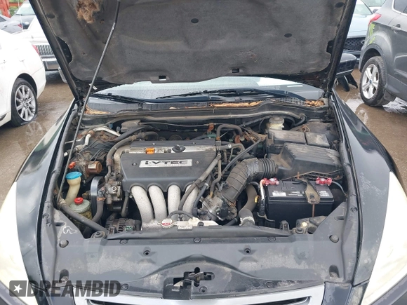 2003 Honda Accord LX with VIN 1HGCM563X3A005819, listed as a IAAI auction lot 42521193 with 105,903 mi miles and . Bid and sale history available at DreamBid. Image 10.