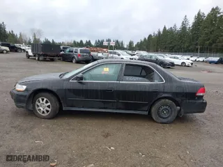 2002 Honda Accord Sdn SE with VIN 1HGCG66802A158278, listed as a IAAI auction lot 41645469 with 264,329 mi miles. Bid and sale history available at carsss.com. Image 13.