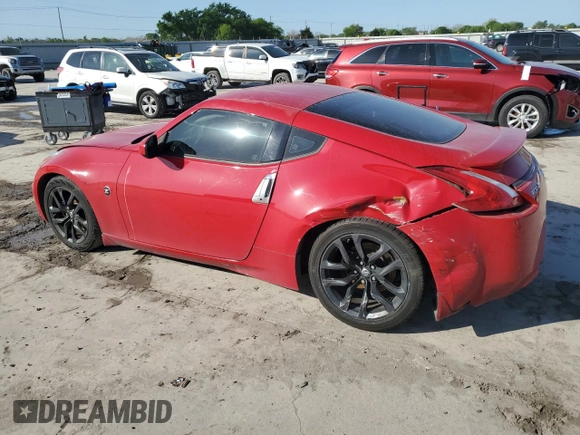 2016 Nissan 370Z with VIN JN1AZ4EH9GM933546, listed as a Copart auction lot 52158905 with 121,678 mi miles and Salvage Title. Bid and sale history available at carsss.com. Image 2.