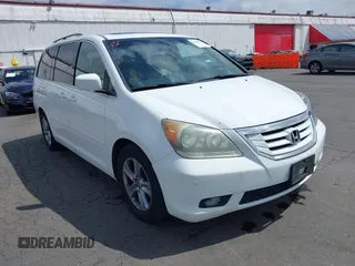 2008 Honda Odyssey Touring with VIN 5FNRL38908B064376, listed as a IAAI auction lot 42489663 with 123,603 mi miles and . Bid and sale history available at DreamBid. Image 1.