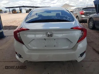 2020 Honda Civic LX z VIN 19XFC2F65LE016523, wystawiony jako Copart lot #55745755 z przebiegiem 66 021 mil mil oraz Szkoda całkowita • Salvage title. Historia ofert i sprzedaży dostępna na DreamBid. Obrazek 6.