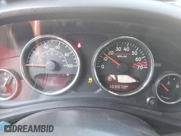 2015 Jeep Wrangler Unlimited Rubicon with VIN 1C4BJWFG1FL602412, listed as a IAAI auction lot 42065619 with 109,070 mi miles. Bid and sale history available at carsss.com. Image 7.