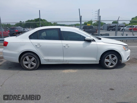 2014 Volkswagen Jetta TDI w/Premium/Nav with VIN 3VWLL7AJ4EM430524, listed as a IAAI auction lot 42268673 with 137,721 mi miles and . Bid and sale history available at DreamBid. Image 12.
