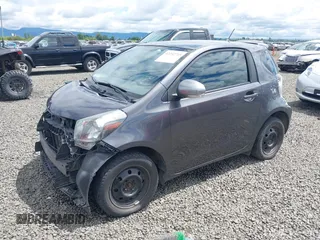 2012 Scion iQ with VIN JTNJJXB00CJ018659, listed as a IAAI auction lot 42232715 with 142,516 mi miles and . Bid and sale history available at DreamBid. Image 18.